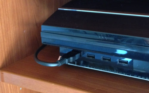 Did anyone use their PS3's USB ports for something other than charging DualShocks and connecting Guitar Hero controllers? I want to meet the one person on Earth who uses their PS3 to print photos.