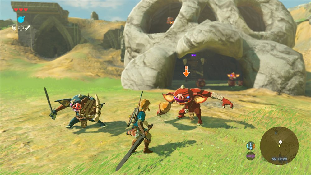 Link fighting two Bokoblins as more pour out from a skull-shaped cave